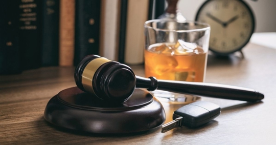 gavel, alcohol and car keys