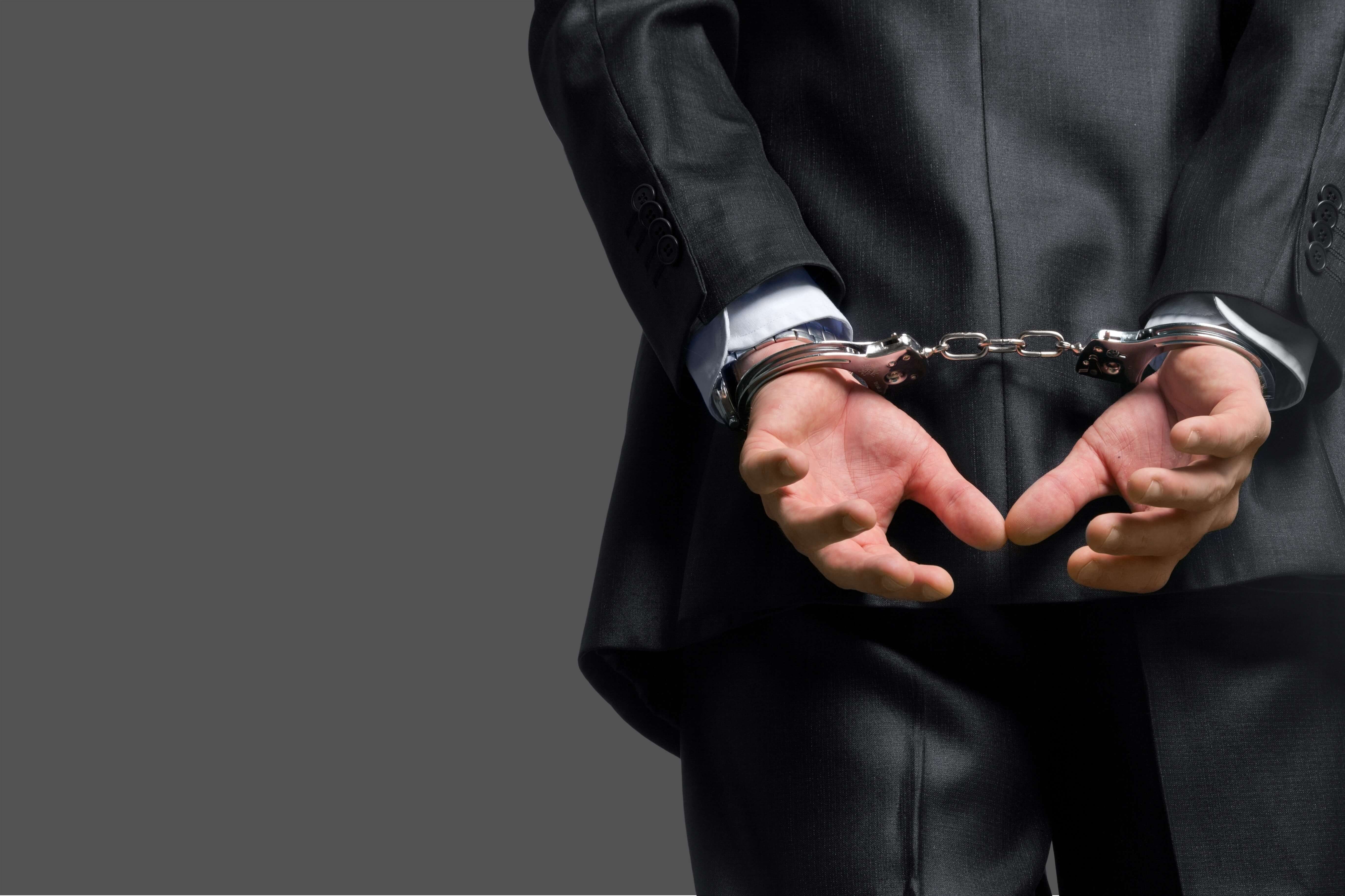 Handcuffs - punishments for white collar crime